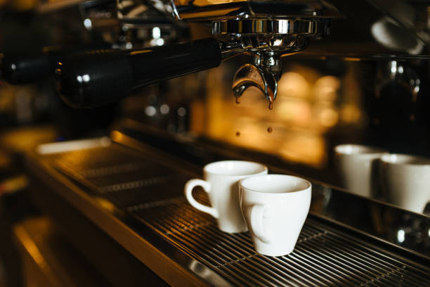 istock Two espresso cups on the coffee machine 1137994410