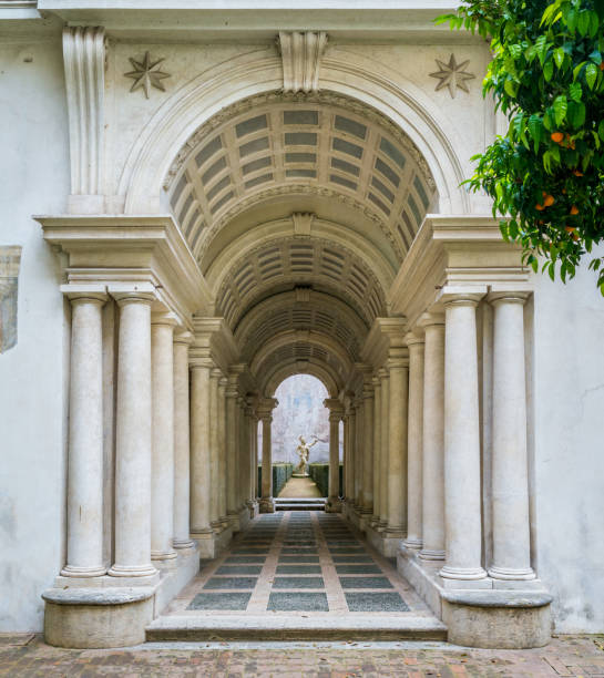 the forced perspective gallery by francesco borromini in palazzo spada, in rome, italy. - famous place architecture indoors decoration imagens e fotografias de stock