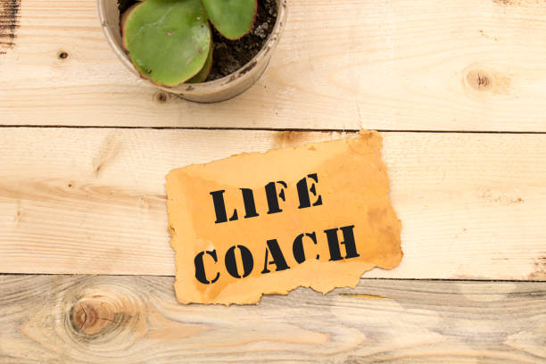istock Note with words life coach on a wooden background 1138000937