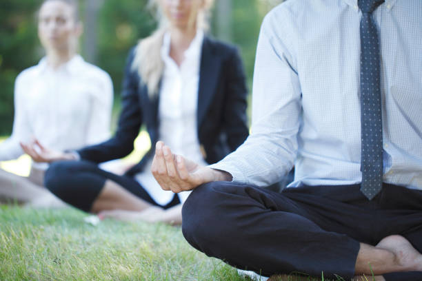 istock Business people practicing yoga 1138001212