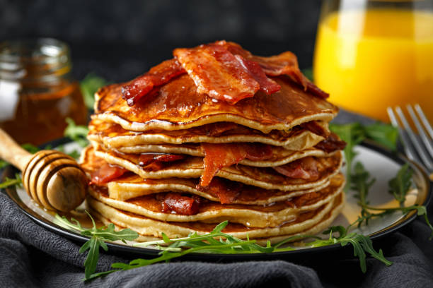 istock Pancakes with crispy bacon and maple syrup in a plate. Morning Breakfast 1138004855