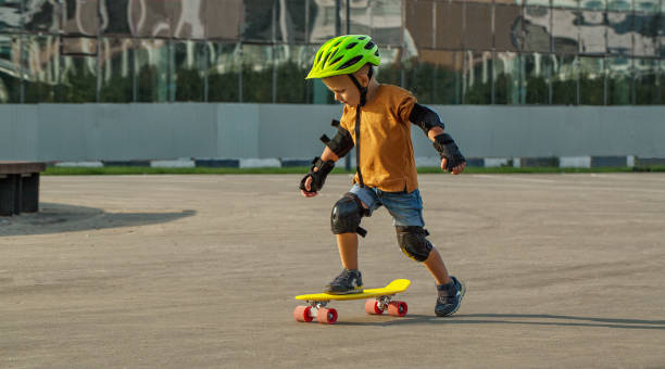istock A little boy enjoys a yellow cruiser penny plastboard 1138004968