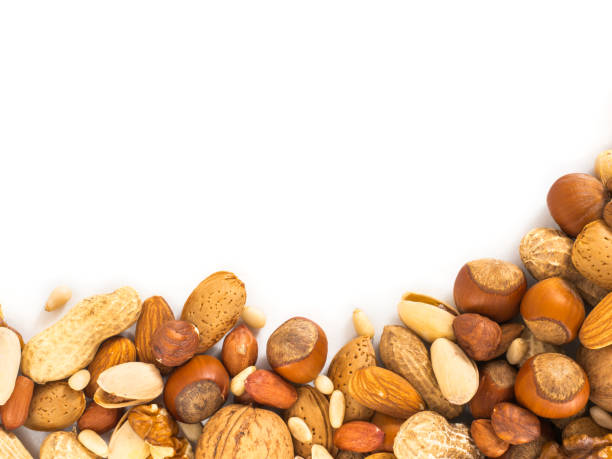 istock Background of mixed nuts with copy space 1138005816