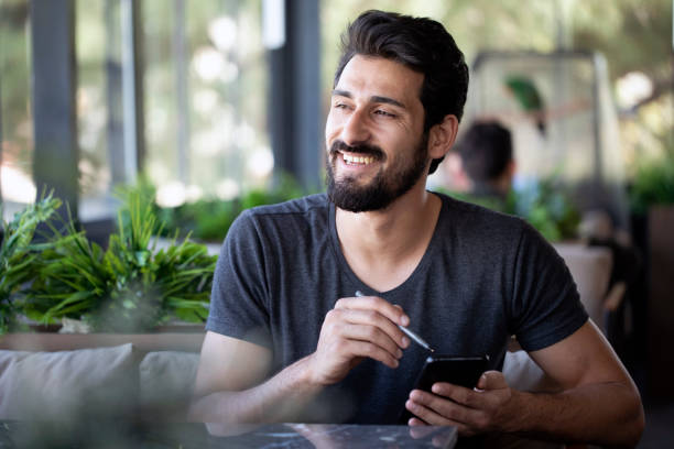 istock Indian Man At Cafe 1138008060