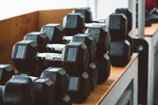 istock Heavy weights in a gym 1138008522