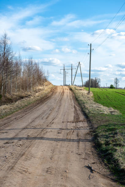 istock empty gravel road in autumn 1138009202