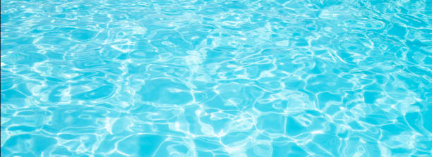 Blue ripped water in swimming pool Summer vacation Banner stock photo