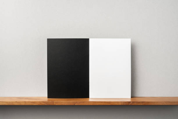 istock front view of black magazine stand on bookshelf 1138012641
