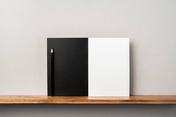 istock front view of black magazine stand on bookshelf 1138012646