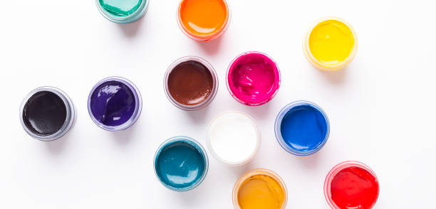 istock Multicolored gouache on a white background Isolated Paints in containers Top view 1138012708