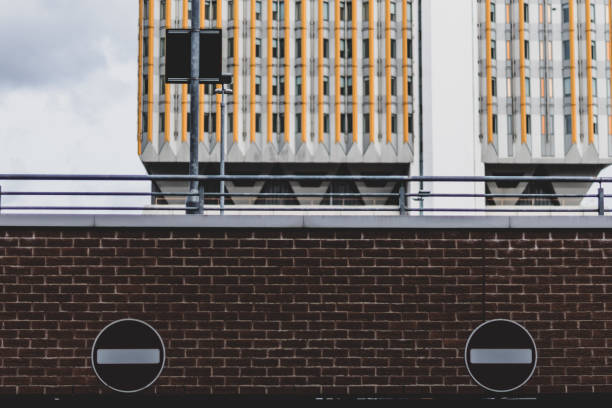 istock Exit from a two storey parking lot, with a modern skyscraper in the background 1138013768