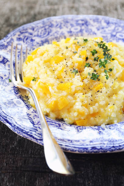 istock Italian cuisine. Yellow bell pepper risotto 1138015852