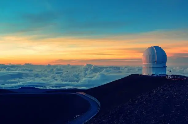 Photo of Telescopes on top of hill on Mauna Kea Space Observatory