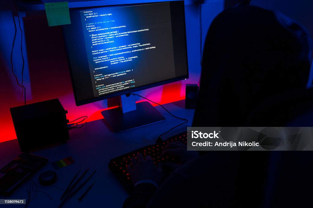 Man Is Programming In A Dark Room Stock Photo - Download Image Now ...