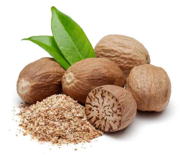 istock Whole and grated nutmeg with leaves isolated 1138020100