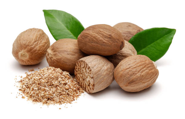 istock Whole and grated nutmeg with leaves isolated 1138020202