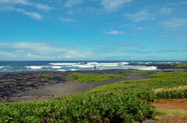 istock Waves crashing against black sand beach 1138020304