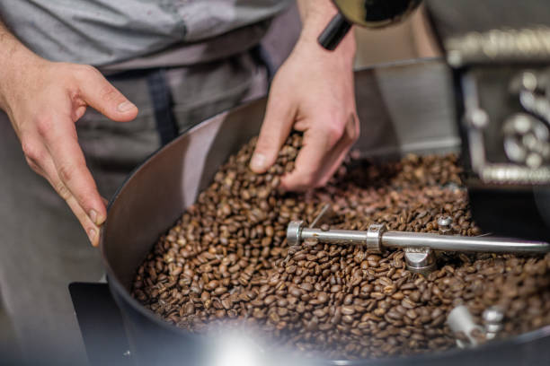 istock Barista Roasting Raw Coffee Beans 1138023433