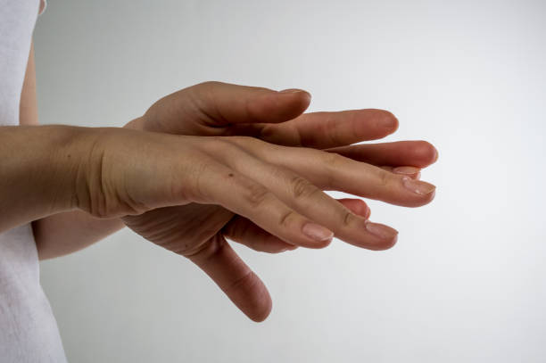 istock Beautiful women hands isolate, applying cream, massaging 1138025658