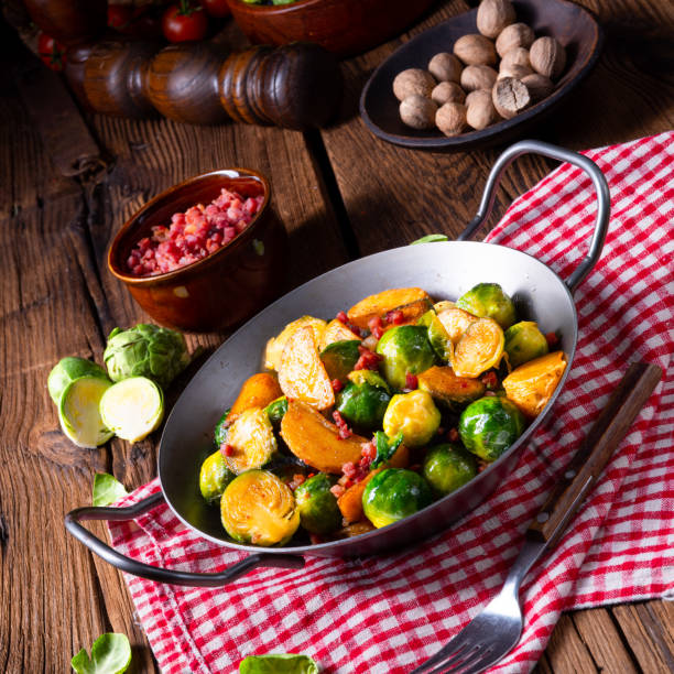 istock Brussels sprouts potato pan with bacon in rustic style 1138026241