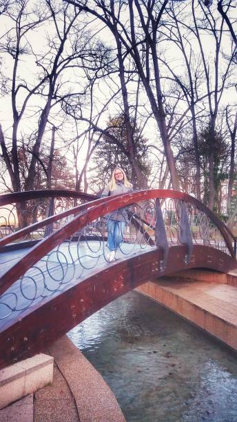istock Girl on the bridge 1138026704
