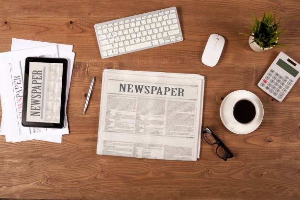 istock woman hands with newspaper 1138029411