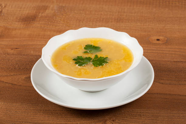 istock soup bowl over wooden table 1138029792