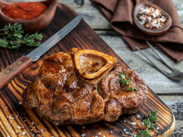 istock Prepared Osso buco Veal shank on a portion board closeup 1138031914