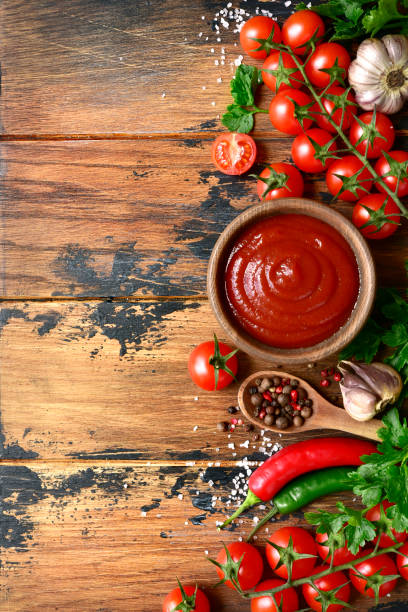 istock Fresh homemade ketchup with ingredients for making 1138031943