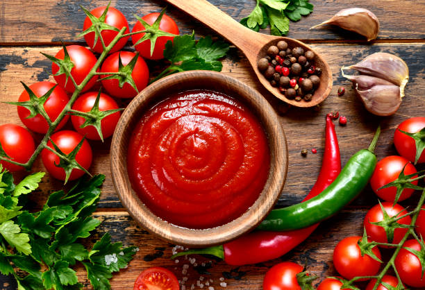 istock Fresh homemade ketchup with ingredients for making 1138031995