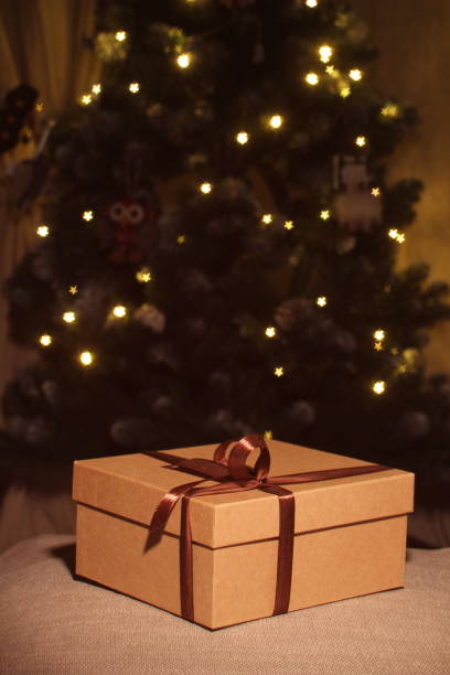 istock close-up open and closed gift box with brown ribbon 1138032874