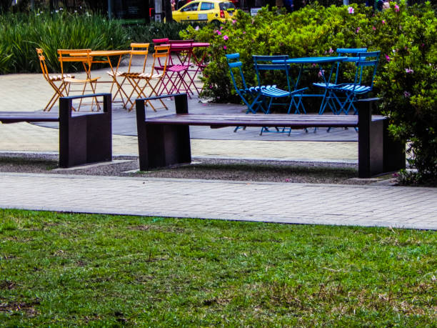 istock Public Park benches and tables and chairs outdoor 1138035173