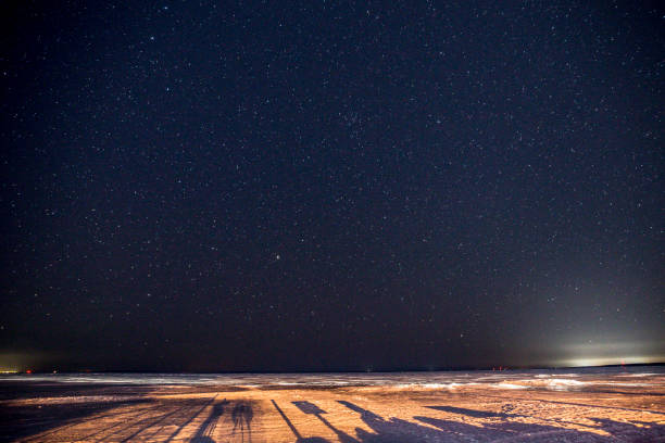 istock Stars over a frozen lake 1138038300