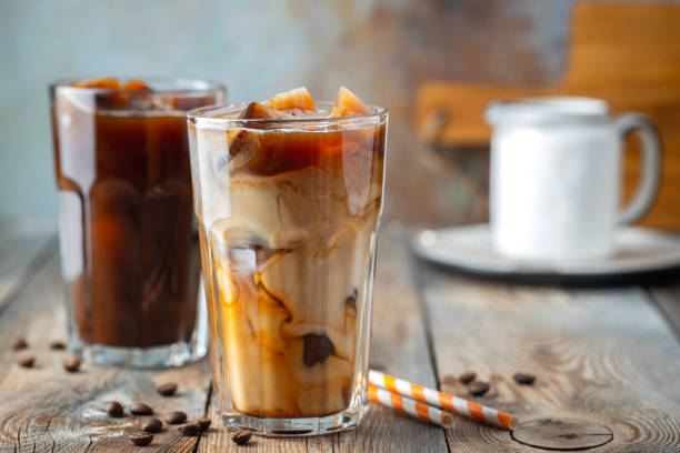 istock Ice coffee in a tall glass with cream. 1138045814