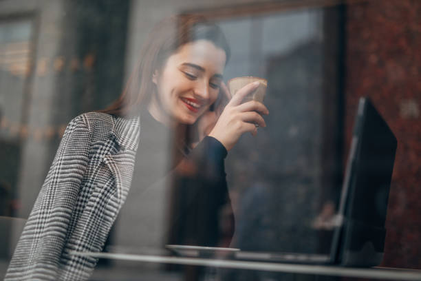 istock Cheerful girl with red lipstick on a coffee break 1138053899