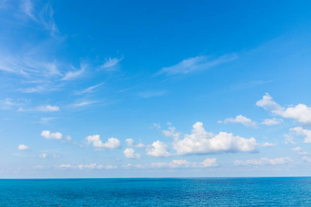 istock Blue sky with clouds background. landscape natural with blue  sea and white cloud. copyspace. 1138058107