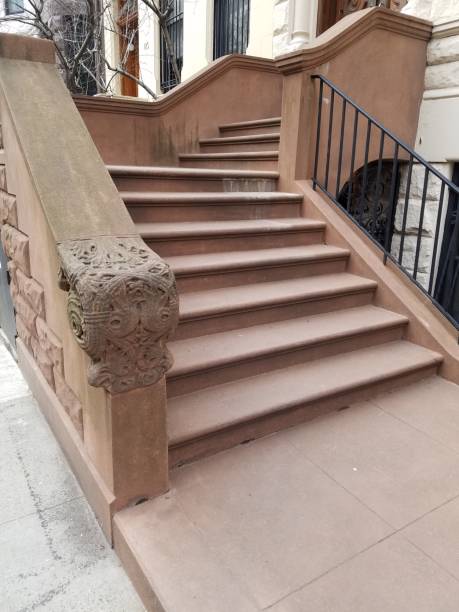 istock Brownstone steps of apartment building 1138058760