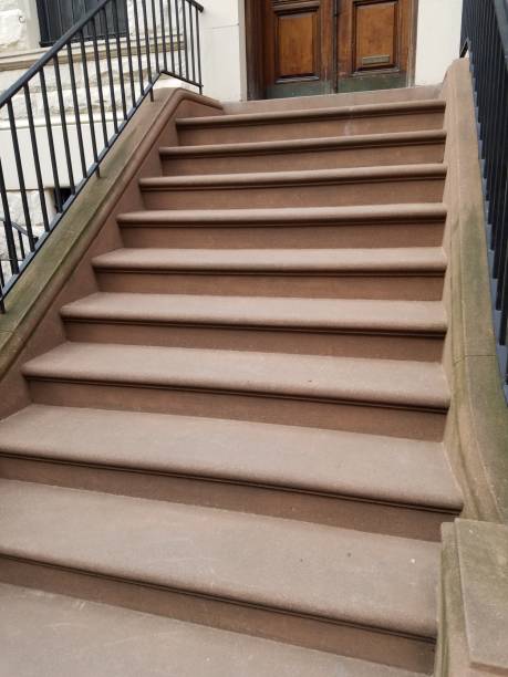 istock Brownstone steps of apartment building 1138058777