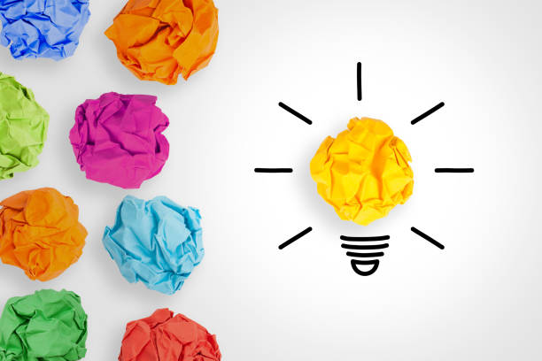 istock Idea Concepts Light Bulb Crumpled Paper on White Background 1138059033