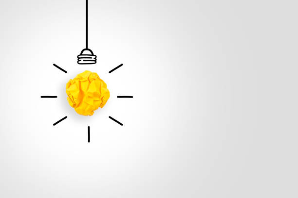 istock Idea Concepts Light Bulb Crumpled Paper on White Background 1138059098