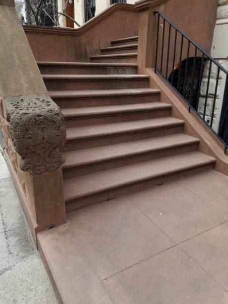 istock Brownstone steps of apartment building 1138061763