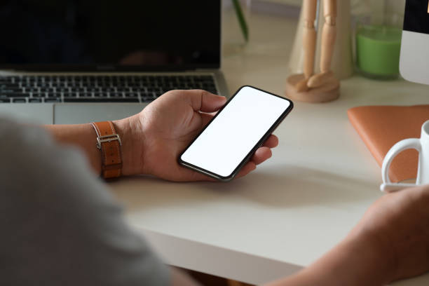 istock Man holding mobile smart phone 1138064552