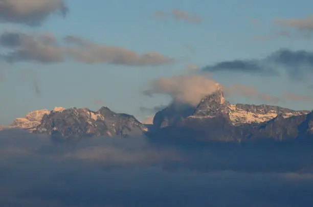 Clouds surrounding the beautiful Dolomites mountains