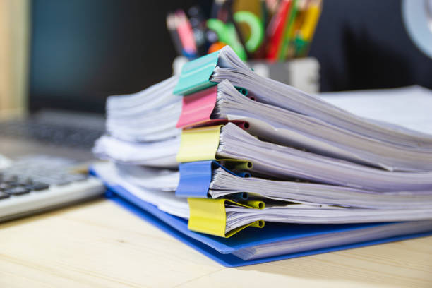 file folder and stack of business report paper file on the table in a work office - pile of newspapers audio imagens e fotografias de stock