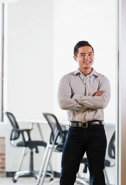 istock Young Vietnamese businessman in office 1138074182