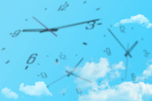 istock Time Management Concept : Many clocks in various time flying in blue sky. 1138077352