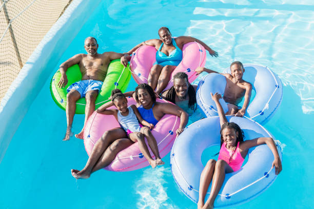 istock Multi-generation family at water park on lazy river 1138078264