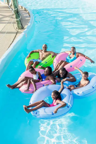 Photo of Multi-generation family at water park on lazy river