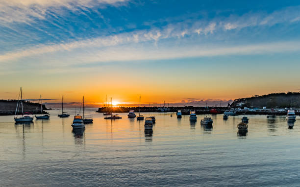 istock Sunrise and boats in the harbour 1138079485