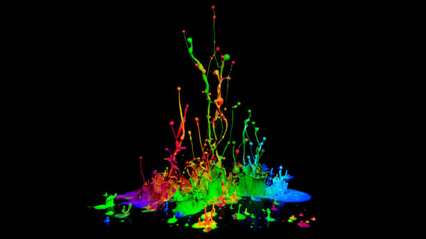 istock Colorful paint splashing on audio speaker isolated on black background 1138081498